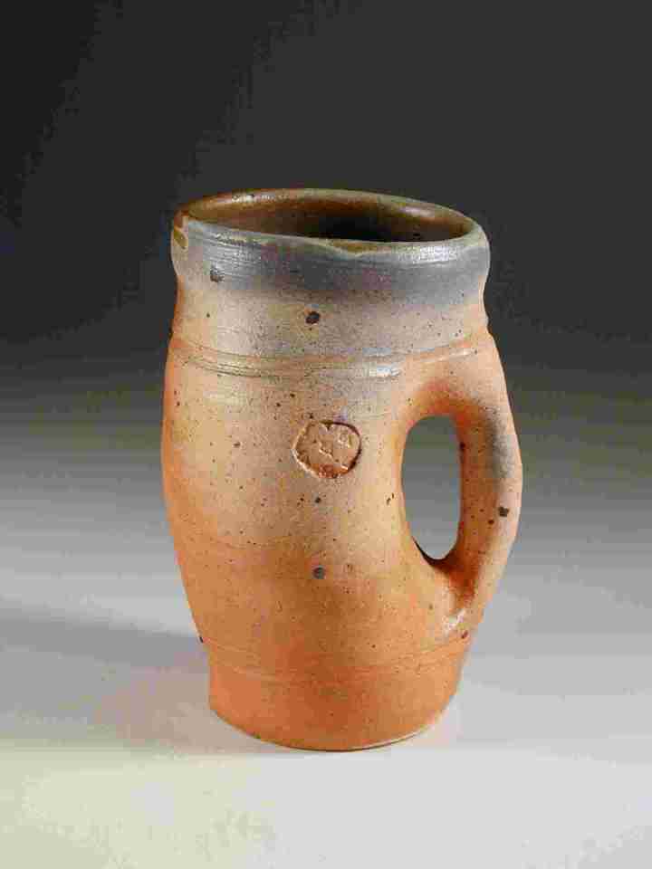 John Chalke. Small jug, 2002. Approximately 20 cm high, Wheel thrown stoneware, wood/soda fired to cone 9-10. Photograph: Barbara Tipton