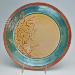 Carol Smeraldo. (DATE?) Raku Plate. Trailed wax resist seaweed pattern. 29.2x3.2 cm.