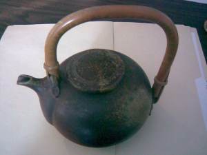 Ruth Gowdy McKinley. Teapot and lid with bamboo handle. Signed RMK on base of handle, under swell of pot body. Canadian Clay and Glass Gallery, Gift of Bob Summerhurst