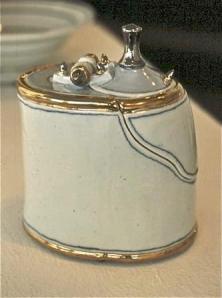 Campbell Porcelain box with porcelain hinges, 1976 - 77. Reduction C/10 with C/018 lustre and black flocked interiors. Courtesy of the artist.