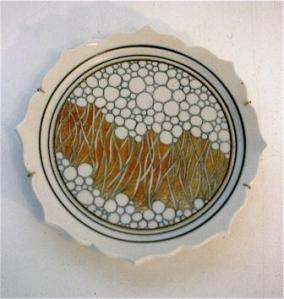 Campbell plate with a tendril design, 1978. Porcelain scalloped edge, press moulded, C/10 reduction, lustres. Courtesy of the artist.
