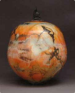 Judy Blake. Saggar-fired Lidded Vessel, 2012. White earthenware fired with straw, sawdust, shavings, coffee grounds, seaweed and copper wire, 47.5 cm x 35 cm. .