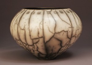 Judy Blake. Naked Raku Vessel, 2009. White earthenware fired in sawdust, 20 cm h x 27.5 cm w.