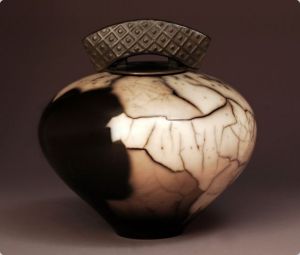 Judy Blake.Naked Raku Lidded Vessel, 2005. white earthenware in sawdust, 24 cm h x 25 cm w.
