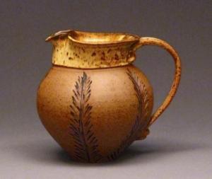 Judy Blake Stoneware pitcher, 1985. 17.8 cm h x 16.5 cm w.