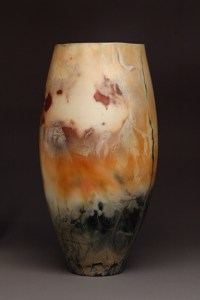 Judy Blake. Saggar-Fired Vessel, 2011. White earthenware fired with sawdust, shavings and metallic soaked straw, 38 cm h x 20 cm w.