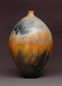 Judy Blake. Saggar-fired vessel, 2012. White earthenware fired with sawdust, shavings , and metallic soaked straw, 40 cm x 27.5 cm. 
