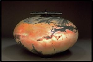 Judy Blake. Saggar-fired Lidded Vessel, 2002. White earthenware fired with sawdust, shavings , and metallic soaked straw, 30 cm h x 34 cm w. 