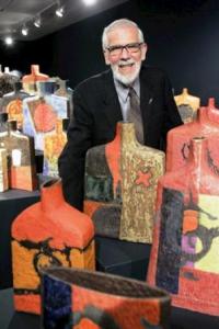 Walter Dexter at his exhibition at Jonathon Bancroft Snell Gallery titled 