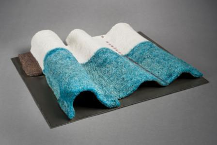 John Chalke. Landscape #4, 1973 or 1975. 26.5 x 32.3 x 5.8 cm. Egyptian paste self glazing clay. Collection of the Alberta Foundation for the Arts.