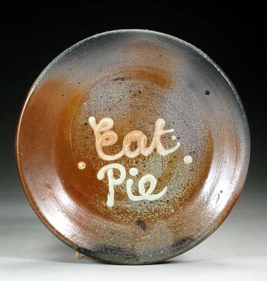 John Chalke [and Barbara Tipton?] Eat Pie Plate, not dated. 23cm. Soda wood-fired stoneware. Carol and Richard Selfridge Collection