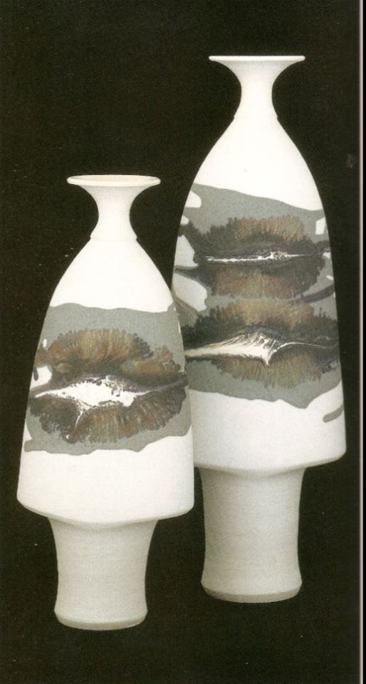 Robin Hopper. Footed Parabolic Bottles. Porcelain with mocha diffusion. Gas fired cone 9. 38.1cm and 43.2 cm tall. Photo: Judi Dyelle.