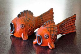 Thomas Kakinuma Red Fish, Large – W24 X H13cm x D8cm, Small – W20cm x H 11cm x 61cm, Red glaze, brushed iron slip, date unknown, Collection of Jasper Sloan Yip and author.