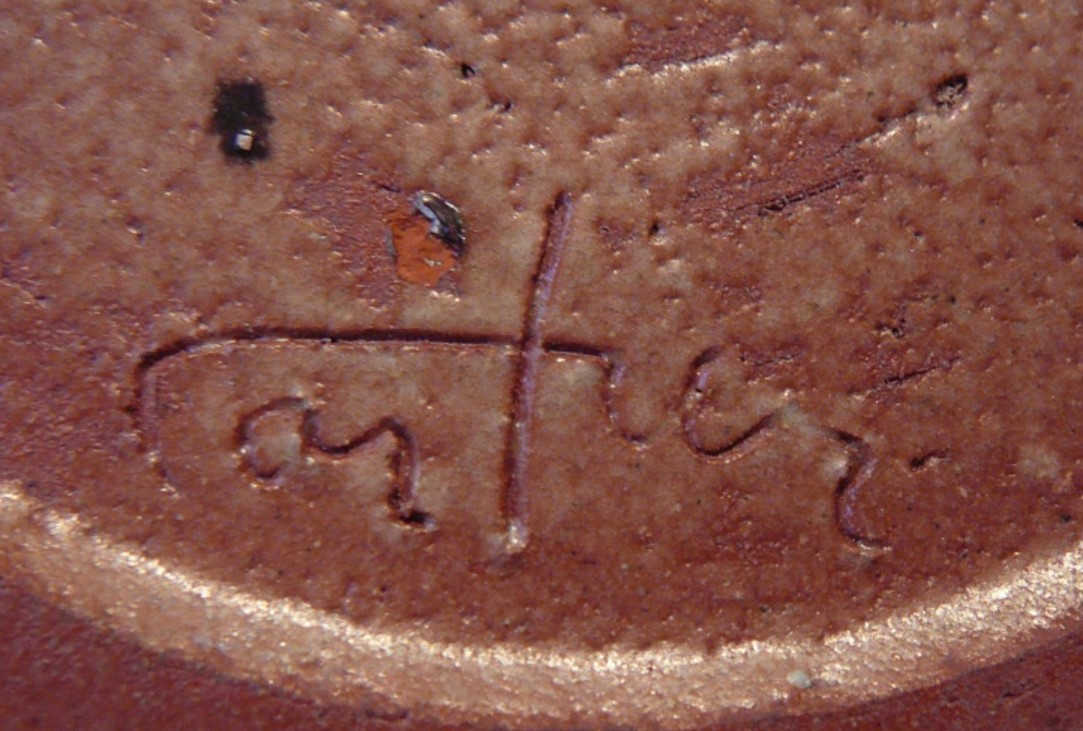 Jean Cartier. Studio ware signature with typical C crossing the “t”.