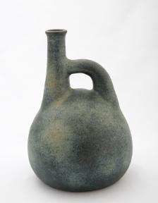 Jan Grove. Jug with Offset Neck, moss green glaze, 1986. 25 x 17 cm. Private collection. Photo: Robert Matheson.