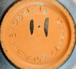 Jan Grove’s incised potter’s wheel and Helga Grove’s painted “H”, with “Victoria Canada”.
