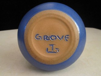 Jan Grove marks on small items such as mugs. Sometimes infilled.