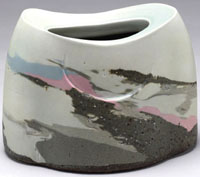 Les Manning. 2007. Sun Up/Sun Down . Laminated stoneware, porcelain with celadon glaze, sandblasted. 18.5 x 25 x 21 cm. Collection: Alberta Foundation for the Arts.