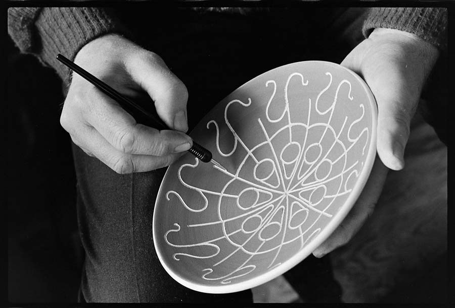 David Lambert, potter, at his home in Ryder Lake near Sardis working on a sgraffito bowl. May 1st, 1974. Photo courtesy John Denniston, www.johndenniston.ca