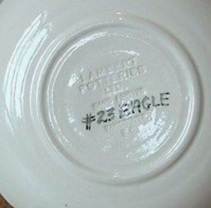 Lambert Potteries Ltd. with impressed label stamp "LAMBERT POTTERIES LTD. HAND PAINTED VANCOUVER BC" with overglaze title and production number.
