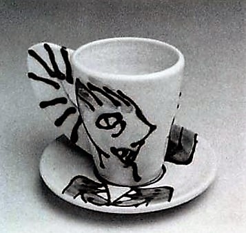 Barbara Tipton. Slip Trailed Cup and Saucer. c. 1984. (Porcelain, approx. 10 cm high) Reproduced in Ceramics Monthly, March 1984. Photo Don Bailey/ Ron Forth.