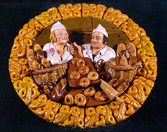 Victor Cicansky. The New Working Class – Bakers. Clay, glaze. 121.9 x 25.4 cm. 1981. Sturdy-Stone Centre, Saskatoon.