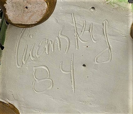 Victor Cicansky signature. “Cicansky 84”, A typical engraved signature, this on the base of a chair sculpture.