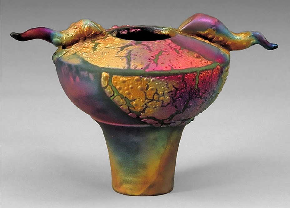 Peter Powning. Ancient. 1996. Slip cast, raku fired and fumed, about 10.2 cm tall, iridescent glaze.