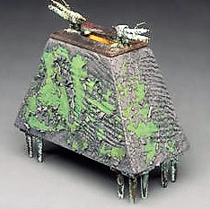 Peter Powning. 1996 Lichen Reliquary, 1996, Raku fired clay, cast bronze, gold leaf. 30.5 cm high. clay, bronze and glass.
