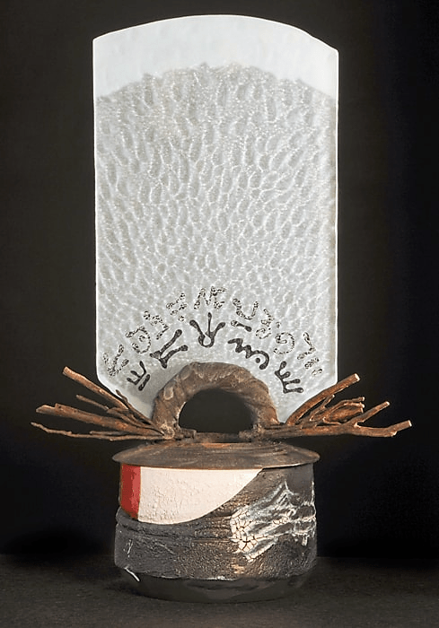 Peter Powning Branch Glyph Arch Vessel. 2009. 73.7 h x 48.3 w x 26.7 deep cm. Glass, cast bronze and ceramics.