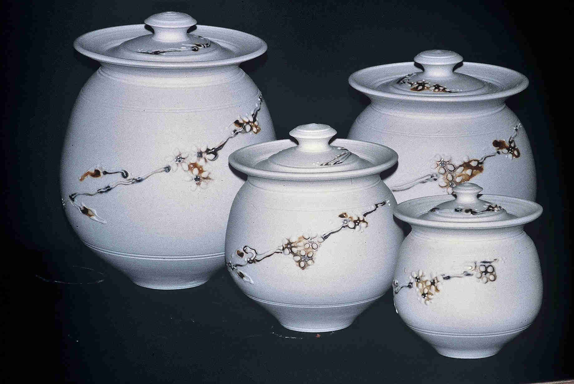 Valerie Metcalfe. Cannister Set. 1980. Porcelain ( unglazed). Left to right: 33 cm, 22.9 cm, 27. 9 cm, and 17.8 cm.