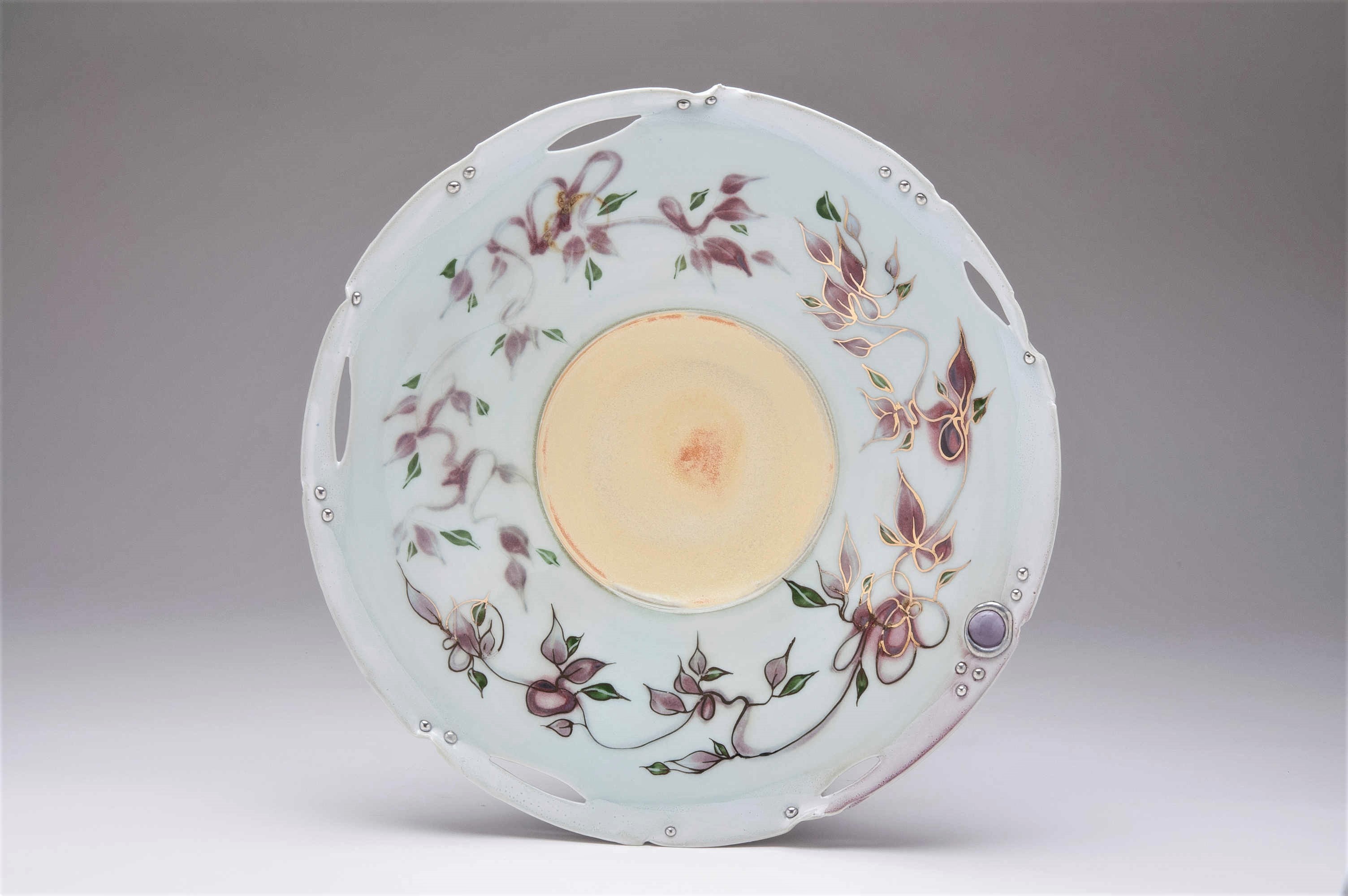 Valerie Metcalfe. Garden in the Sun. 2018. Altered and carved with metal and glass accents. Hand painted with slips and oxides. Gold lustre accents. 40.6 cm w.