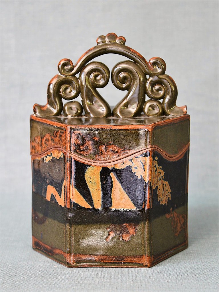 Donn Zver. 1973-74 hexagon jar with crested handle. Art Gallery of Burlington Collection.