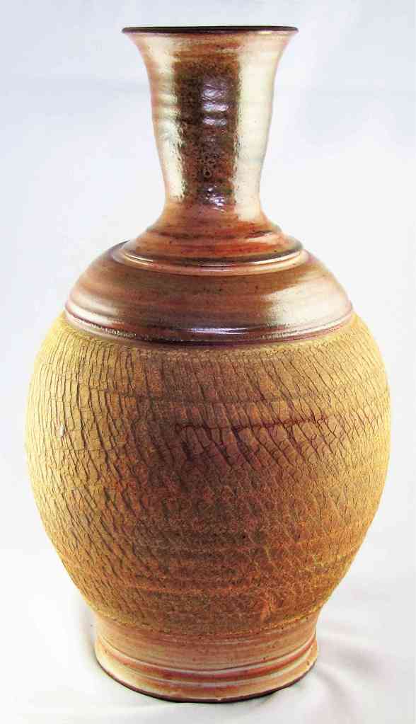 Donn Zver. Vase. 2018. Wood-fired. Sodium silicate decoration on lower surface, shino glaze on the top. 33 x 20.3 cm.