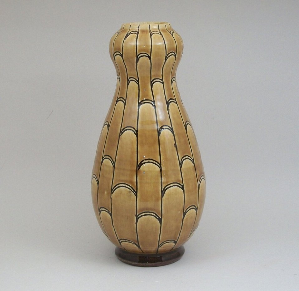 Birdsall-Worthington. Amber Double Gourd Vase. Earthenware. White slip clay incised with bamboo pattern; amber glaze. 24.8 cm.