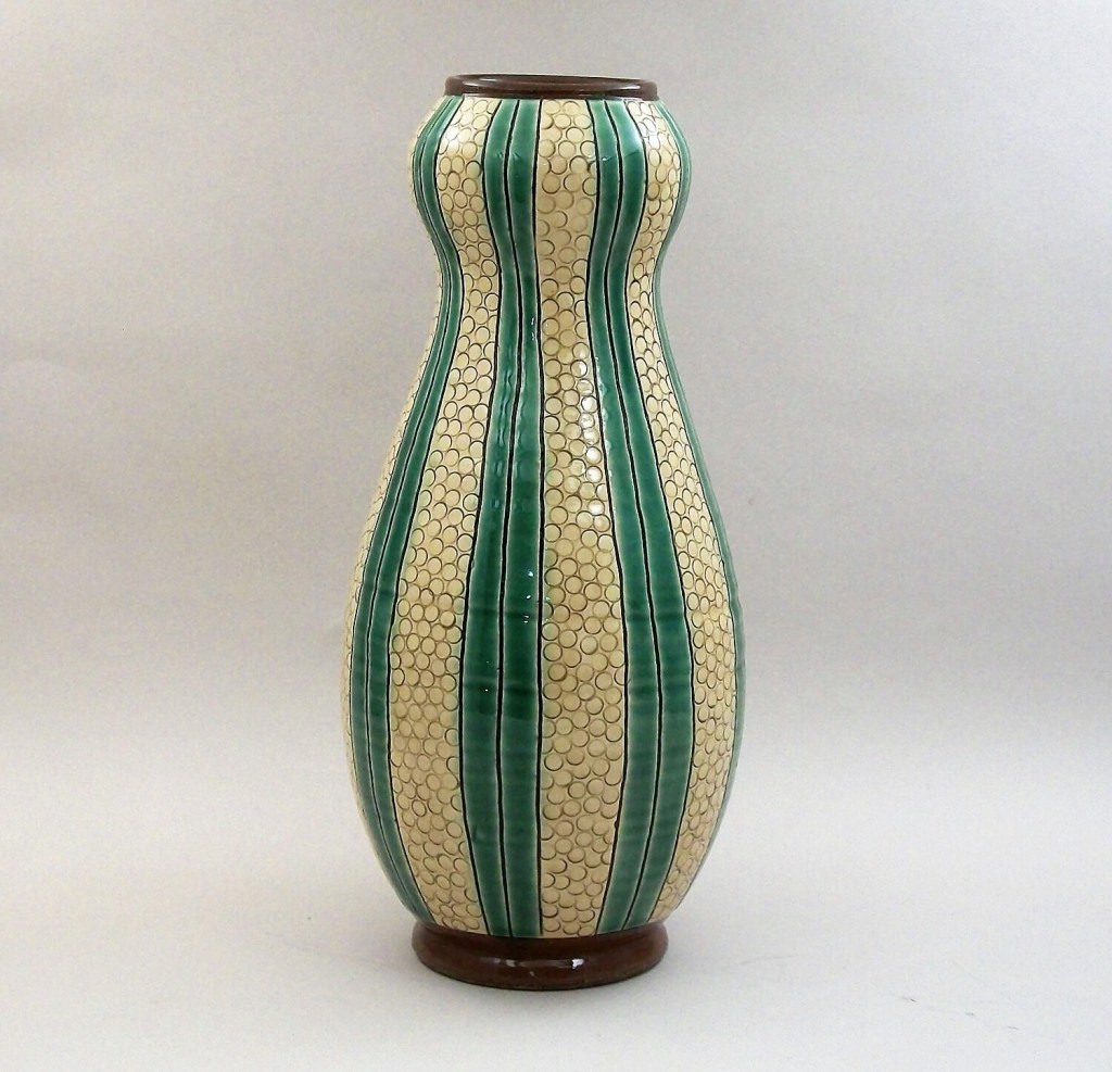 Birdsall-Worthington. Green and Yellow Double Gourd Vase. Earthenware. Covered with a white slip; incised lines and circles. Alternating panels of yellow and green glazes. 24.8 cm.