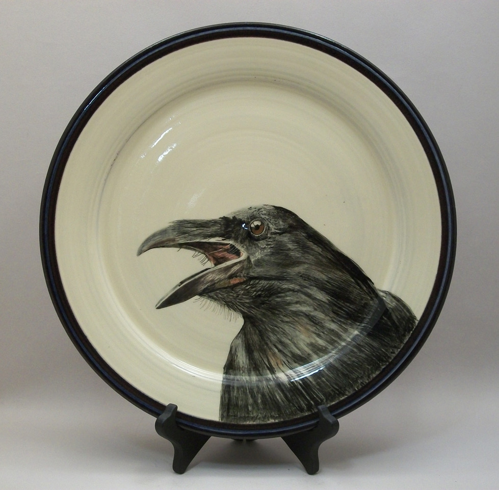Birdsall-Worthington. Crow. 2018. 34.7 cm. Earthenware clay. Earthenware. Lantz clay with white slip and underglaze covered with a transparent glaze and fired to cone 03.
