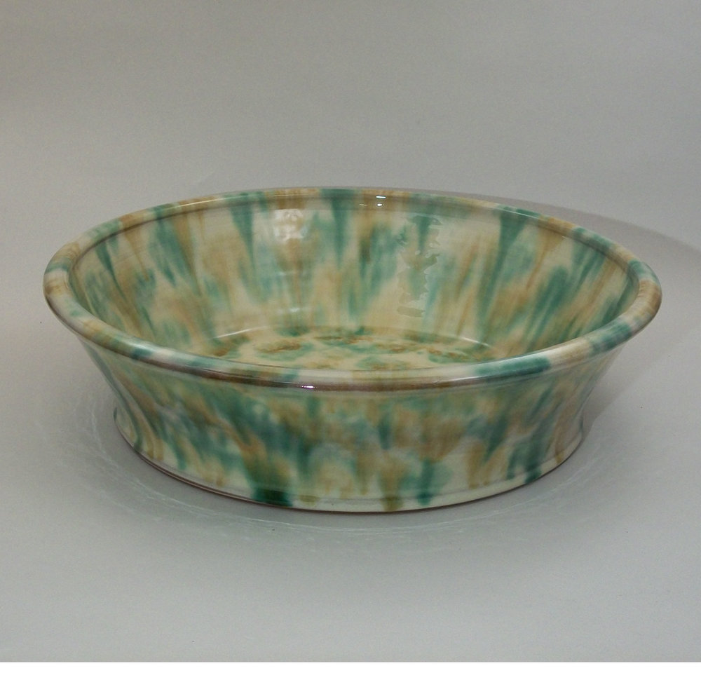 Birdsall-Worthington. Serving Bowl. Earthenware. Green and yellow glazed sponged on. 31.1 cm diameter.