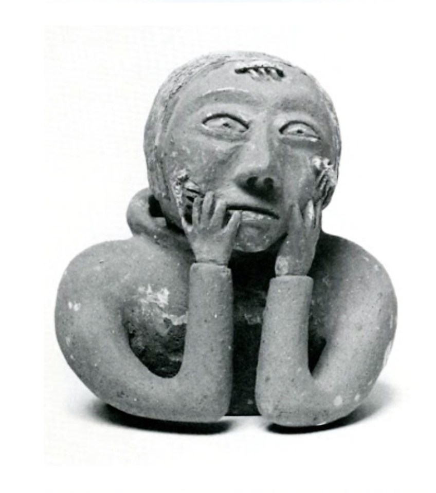 Donat Anawak. Woman with Lice on her Face. c.1967. Red fired clay. 20.3 x 19.7 x 19.1. Donated by the Women's Committe. G-67-26. Photo: Rankin Inlet/Kangirlliniq.