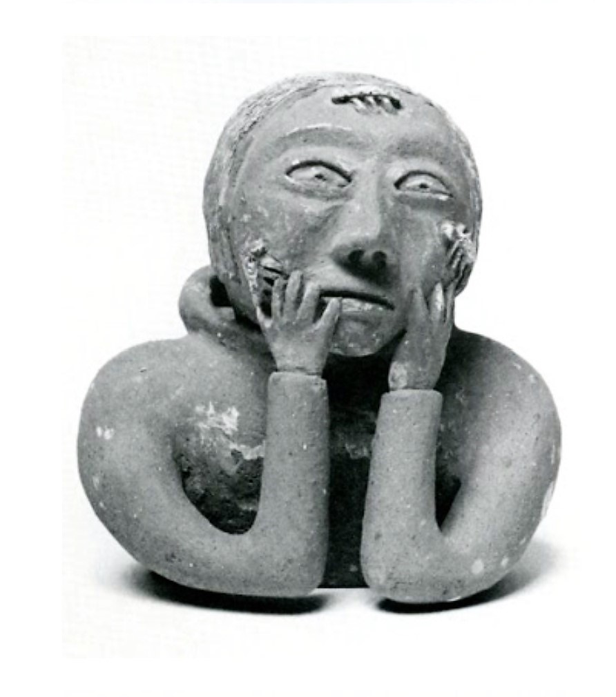 Donat Anawak. Woman with Lice on her Face. c.1967. Red fired clay. 20.3 x 19.7 x 19.1. Donated by the Women's Committe. G-67-26. Photo: Rankin Inlet/Kangirlliniq.