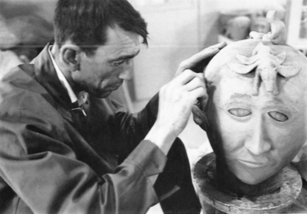 Robert Tatty Working on a Head. Photo John Reeves ; https://maryloudriedger2.wordpress.com/tag/robert-tatty/