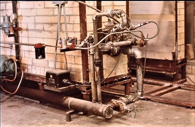 Part of the kiln set-up in the pottery workshop. Rankin Inlet (Pottery Workshop) George Swinton fonds (WAG) Prairie Prestige: How Western Canadian Artists Have Influenced Canadian Art A slide depicting part of the kiln set-up in the pottery workshop. still image .April, 1971 Rankin Inlet, Nunavut